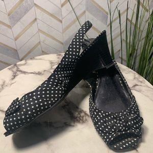 Black pumps with white polka dots